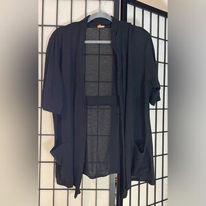 Womens Mid Length short sleeve cardigan.